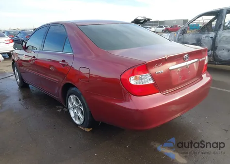 2003 Toyota Camry Le z USA, uszkodzony, nr VIN 4T1BE32K33U203726